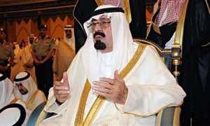 Saudi King Abdullah bin Abdulaziz Al Saud attends prayers on the first day of Eid al-Fitr at Al-Safa Palace in Mecca