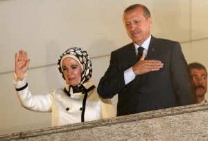 Turkey's Prime Minister Tayyip Erdogan, accompanied by his wife Emine