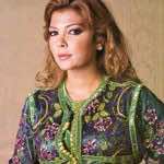 Syria's famous Asala Nassri wearing the Moroccan Kaftan