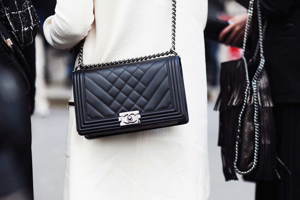 Louis Vuitton Chanel Rise as Prada Falls in Luxury Brand Survey  Bloomberg
